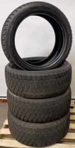 (4) Bridgestone Blizzak DM-V2 P285/45 R22 Studless Tires