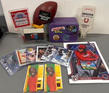 Mixed Memorabilia Lot: Beer Tap Handles, Vintage Cards, and Collectibles