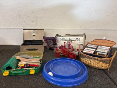 (1) Antique Millenium Farm Classic Tractor (1) Cash box (1 ) Box Of Cassette Tapes (1) Cat Toy Interactive (1) Case Of Kids Train Toys and Tracks