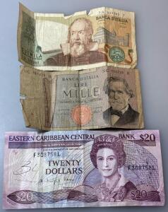Vintage Currency Notes Includes (2) Italian Lira Banknotes From The Banca d'Italia And (1) 20 Eastern Caribbean Dollar