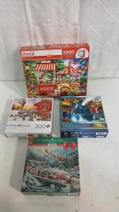 (4) Christmas Puzzles Including Coca-Cola And The Polar Express & More
