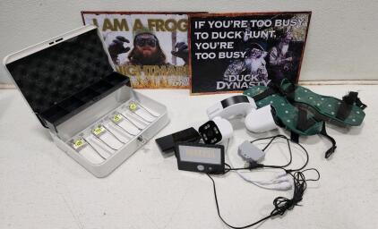 (1) PHANSATIM Dual-Lens Outdoor Wi-Fi Security Camera (1) Cash Box with Money Tray and Key Lock (1) Pair Of Lawn Aerator Shoes (2) Duck Dynasty Tin Wall Sign