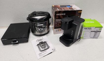 (1) Keurig K-Express Essentials Single Serve K-Cup Pod Coffee Maker (1) Aroma 6-Cup Pot Style Rice and Grain Cooker (1) Power Cooker 6-quart Digital Electric Pressure Cooker (1) Black Metal Keurig Coffee Pod Storage Drawer