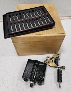 (1) Danny Fowler "Invader" Coil Tattoo Machine (1) Tsunami Tattoo Power Supply (1) Stainless Steel Tattoo Tips Set Of 20 (1) Vintage Oak Wood Index Card Storage Box