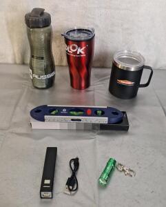 (1) 9" Torpedo Level, (1) 2200mhA Power Bank, (1) Mini LED Flashlight, (1) 15-Oz Stainless Steel Insulated Mug W/ Lid, (1) 20-Oz Stainless Steel Mug W/ Lid & (1) 20-Oz Water Bottle