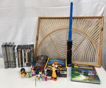(1) National Geographic STEM Build Your Own Volcano,(1) LEGO Ninjago Book , Disney Figurines ,Assorted DVD & VHS Movies & Series- Ghost Busters , Gladiator, Tomb Raider & More