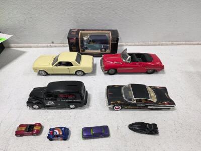 (1) Nifty Fifties Leadworks 1950 Red Buick Tin Friction Propelling Toy Car Japan 11" (1) 1:18 Scale 1965 Ford Mustang by Revell Inc. (1) 1:24 Scale Jada Toys 1960 Chevrolet Impala Diecast Model Car (1) Liberty Classics 1940 Ford Diamond Rio Delivery Panel