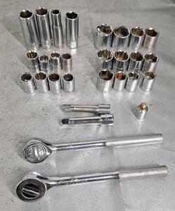 (2) 3/8" Drive Ratchets, (2) Extensions & Assorted Sockets