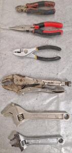 (2) Crescent Wrenches, (1) Pair Of Vice Grips, (1) Pair Of Standard Pliers, (1) Pair Of Needlenose Pliers & (1) Pair Of Cutters