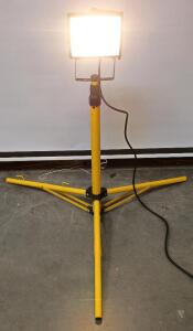Portable Halogen Work Light On a Tripod Stand.