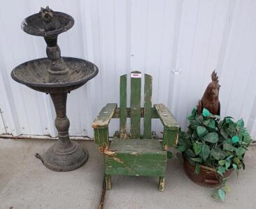 Campania Williamsburg Pineapple 2-Tier Fountain. Vintage-Style Green Wooden Adirondack Chair, Decorative Metal Chicken Planter With a Faux Pothos Plant.