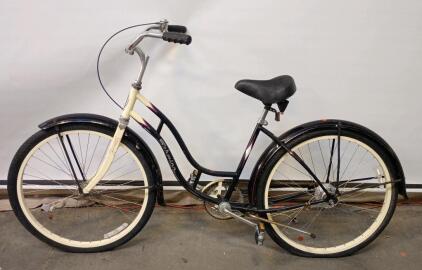 Women's Schwinn Cruiser Seven Beach Cruiser Bicycle. <br/>It Features a 7-speed Drivetrain With Shimano Grip Shifters.