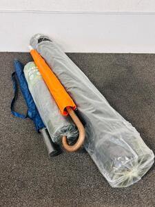 (2) Rolls Of Landscape Fabric Weed Barrier and (2) Umbrellas