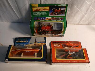 (1) Vintage Smoky Express Battery Operated Train (1) Vintage Challenger II Battery Operated Boat (1) Vintage Midnight Thunder Battery Operated Helicopter