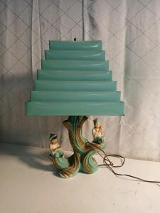 Vintage Turquoise Table Lamp with Tiered Metal Shade and Figurine Base