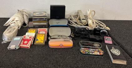 Home Lot (1) Samsung Internet Modem Various CDs Including Disney Christmas The Goo Goo Dolls And CM Riders (1) Fuji Film Camera With Charger (1) Samsung Camera (1) Mini. Andra Phone And More