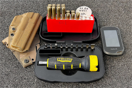 The Fat Wrench Kit, Holster, Garmin Oregon 600t (Powers On), and (8) Rnds Of Nosler 280