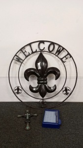 Welcome Sign, Paper Cutter, and Cross