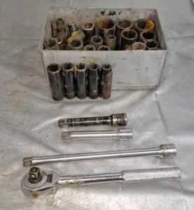 (1) 1/2" Drive Ratchet, (3) Extensions & Assorted Sockets