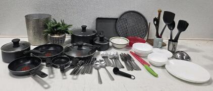 (1) T-Fal Cookware Set, 3 sauce pans, 4 frying pans (1) Set of Corelle Dishes, white, service for 4, (1) Set Onida Flatware and More