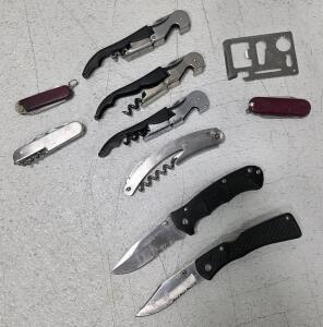 (1) Winchester Folding Knife, 3" Blade (1) Frost Folding Knife, 3" blade (1) Promotional Stainless Steel Multi-tool Pocket Knife with Advertising for "SAMSUNG FIXTURES" (1) 11-function Stainless Steel Survival Pocket Tool (2) Small, Swiss Army Style Kniv