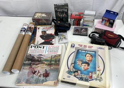 Lot Of Assorted Items - 15+ Blank Cassette Tapes, 2 Stevie Ray Vaughan Tapes , 2 Film Cameras , Lazer Disk Movies, Anime Movies, Platoon PC Game & More