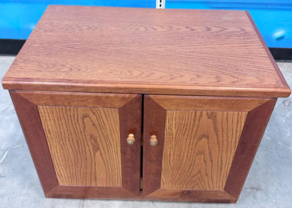 Compact Brown Wooden Cabinet with Hinged Doors and Two Drawers
