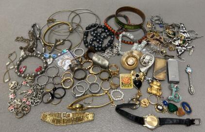 Diverse Jewelry Assortment: Rings, Bracelets, Watches, Charms