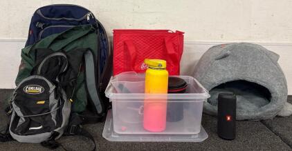 (3) Backpacks Various Sizes And Colors Various Kitchen Accessories Including Tempshield Insulated Waterbottle (1) Cat Bed (1) JBL Speaker Tested and Runs