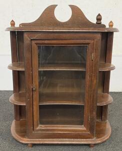 Wooden Curio Cabinet with Glass Door, 3 Shelves, Decorative Crest