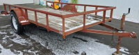 BROWN FLAT BED TRAILER