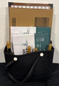 Women&rsquo;s Lot (1) Large Tote (2) Stone Dish Drying Matts (1) Stone Bath Matt (1) Wooden Picture Frame (4) Bottles Soiced Pear Bubbly Reserve
