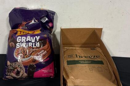 (1) 22 lb Bag Friskies Cat Food And (1) 28 lb Bag Purina Cat Litter