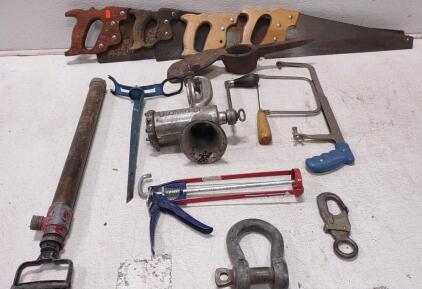 Meat Grinder, (2) Hack Saws, (4) Wood Saws, Fishing Pole Holder, Pick Axe Head, And More.