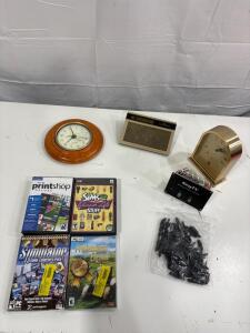 KeyTV Multisource Signal Controller, Model 18081-202, Serial SYT120008435 And (3) Clocks And Assorted DVD&rsquo;s