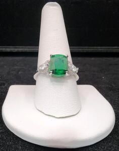 (1) Size 10 Faceted Emerald Cut Emerald .925 Ring