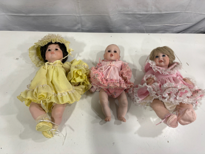 Three Porcelain Dolls, Blonde & Brunette Hair, Pink & Yellow Dresses