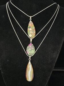 (1) 21.35 Ct. Natural Brown/White Striped Necklace (1) 12.45 Ct. Natural Red Ruby And Zoisite Gemstone .925 Necklace (1) Rainbow Sea Sediment Jasper Teardrop .925 Necklace