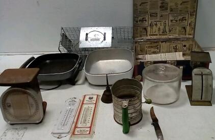 Rodent Trap. Electric Skillet (Powers On.) (2) Postal Scales. 1 Collectable Suitcase. +More.