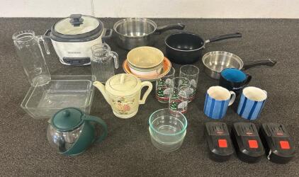 Assorted Kitchenware- (1) Black & Decker Rice Cooker (power tested and works), Multiple Pyrex Glass Dishes, (3) DrillMaster Rechargeable Batteries, Assorted Holiday Cups/Mugs, (3) Cooking Pots and more!