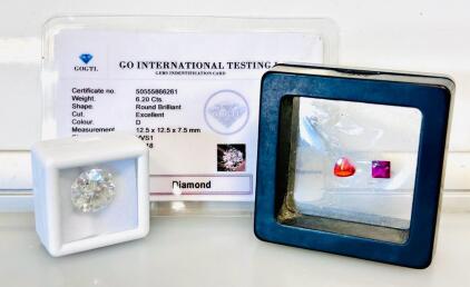 6.20 Carat Round Brilliant Diamond, D Color, VVS1 Clarity, Certified, and (2) Gemstones (Square and Heart Unkown Info)