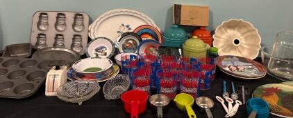 Kitchen Lot Including Cupcake Pans Measuring Cups And Sooons (3) Piece Canister Set Various Plates And Bowls