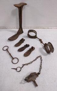 (1) Antique Cast Iron Cobbler's Shoe Repair Stand w/ (3) Other Accompanying Shoe Forms, (1) Antique Leg Shackles, & (1) Small Game Leghold Trap