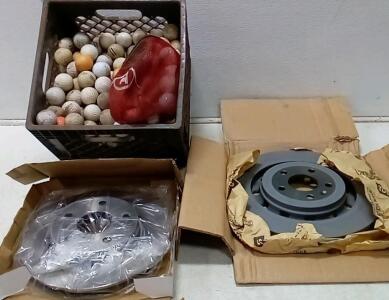 (2) Front Automobile Rotors. (1) Front For Ford Escape 2013-2019. (BBRF2CR.) (1) Jeep 1997-2006 Part # AR8780 From Autospecialty. Crate Of Golf Balls.