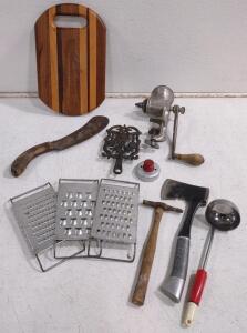(1) Vintage Cast Iron Trivet, (1) Antique Universal No. 2 Cast Iron Hand-Crank Meat Grinder/Food Chopper, (1) Antique Sugar Beet Knife, & Much More