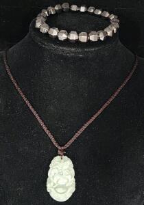 (1) Light Celadon Green Jadeite Jade Monkey Pendant Necklace (1) Faceted Hematite Beaded Stretch Bracelet