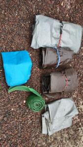 (OFFSITE) Assorted Poly Tarps &ndash; Blue, Brown, Silver, Green &ndash; Mixed Sizes, Grommets, with Bungee Cords