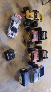 (OFFSITE) Lot of (5) Assorted Vintage RC Toy Trucks