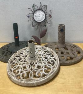 (3) Heavy Metal Umbrella Bases and (1) Yard Temperature Gauge
