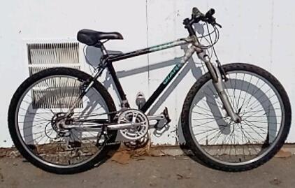 26" Giant ATX760. 18 Speed. Black & White. Tires Need Air. Brakes Need Work.